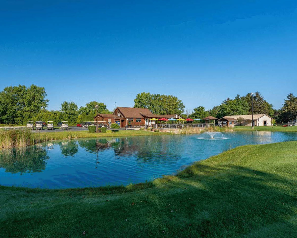 Spring Creek Golf Center clubhouse course and water hazard pond